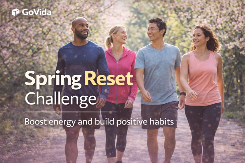 A group of people walking outdoors in spring as part of a seasonal workplace wellbeing challenge.